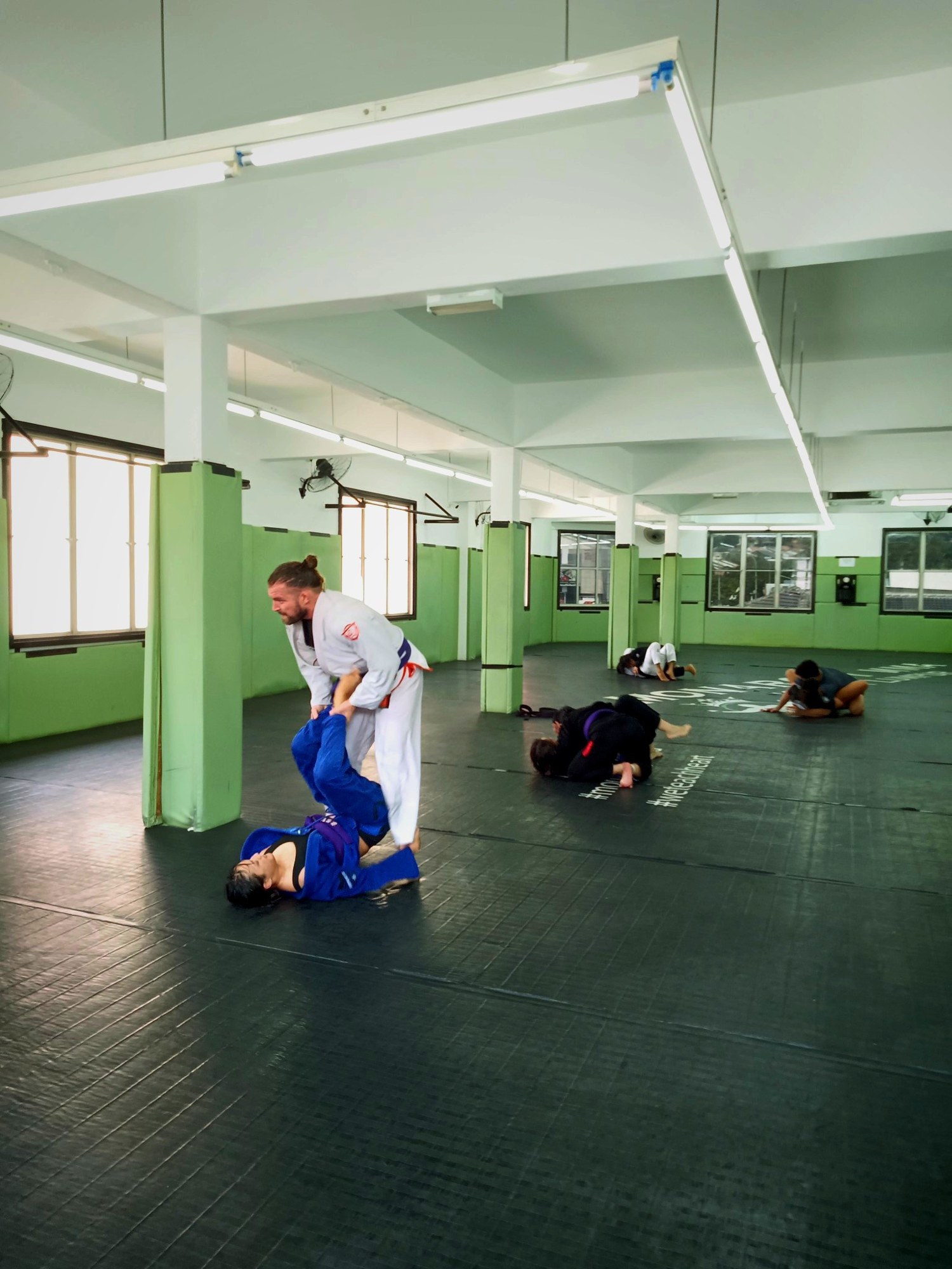 Sweeping your opponent from half guard at Monarchy MMA Sweeping your opponent from half guard at Monarchy MMA